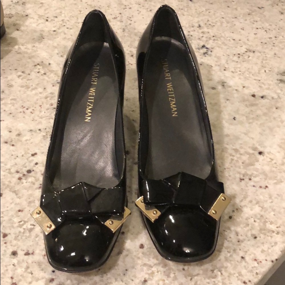 Stuart Weitzman pumps.
